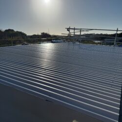 Completed Fairhaven re-roofing project featuring SureClad corrugated roofing in COLORBOND® Ultra Dune®.