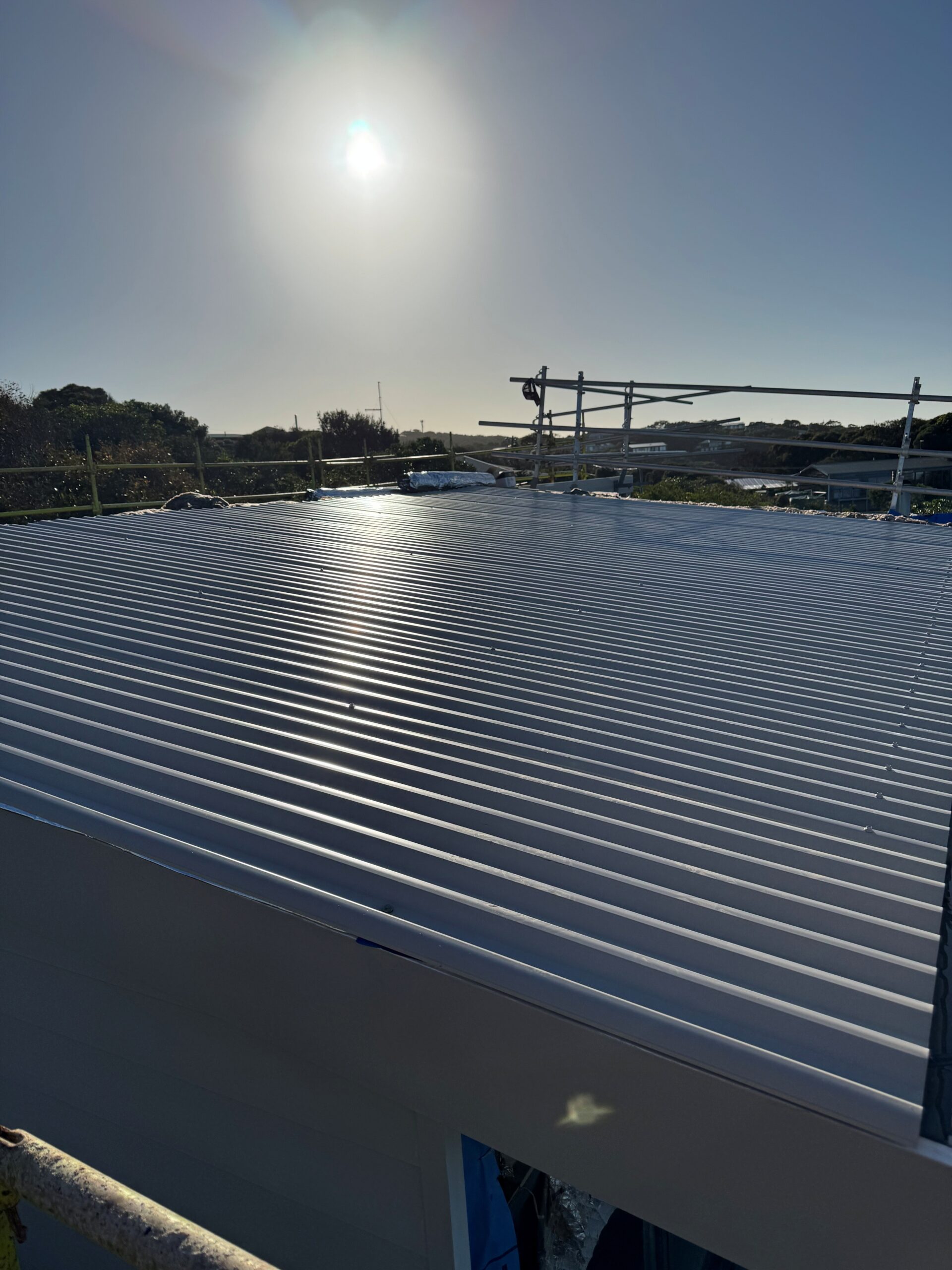 Completed Fairhaven re-roofing project featuring SureClad corrugated roofing in COLORBOND® Ultra Dune®.